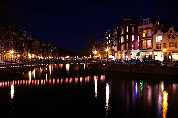 istock Amsterdam innercity by night in the Netherlands 95079756