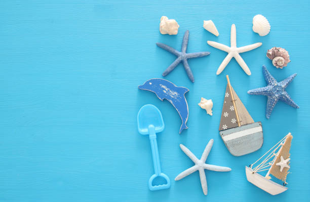 istock nautical, vacation and travel image with sea life style objects. Top view. 950801600