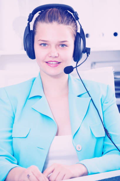 istock Portrait of dispatcher female which is talking with client 950806956