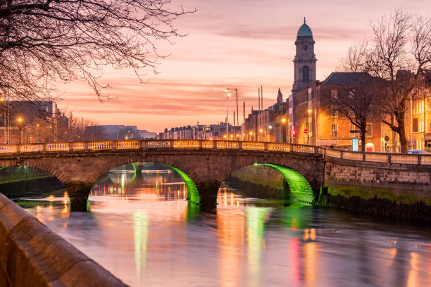 River Liffey Dublin Ireland Grattan Bridge in Dublin, Ireland on the evening .This historic bridge spans the River Liffey in Dublin, Ireland. ireland stock pictures, royalty-free photos & images