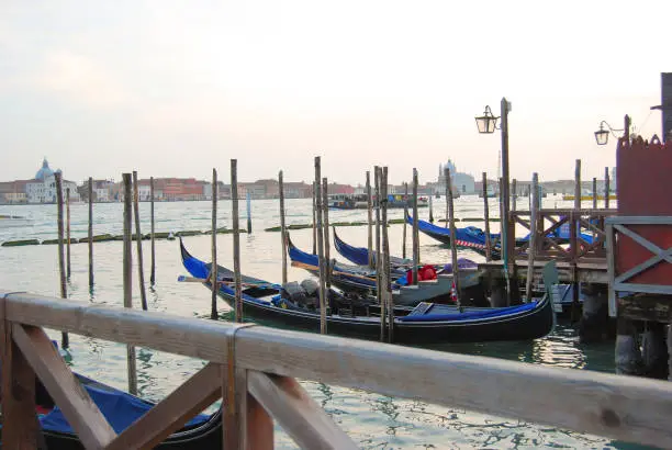 Photo of Gondolas with a view of the Basilica of San Giorgio Maggiore in Venice