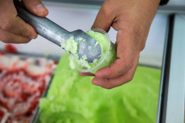 Serving lemon ice cream