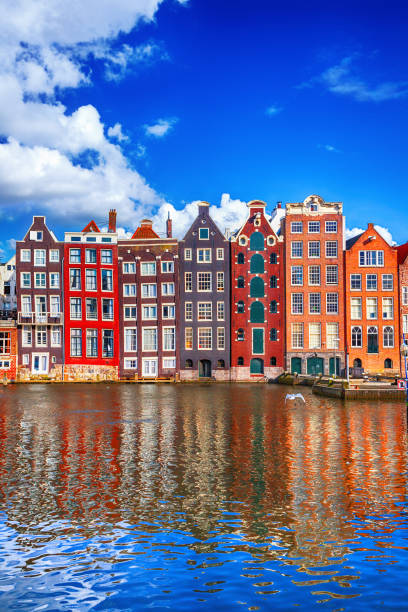 Houses in Amsterdam Houses in Amsterdam canal house photos stock pictures, royalty-free photos & images