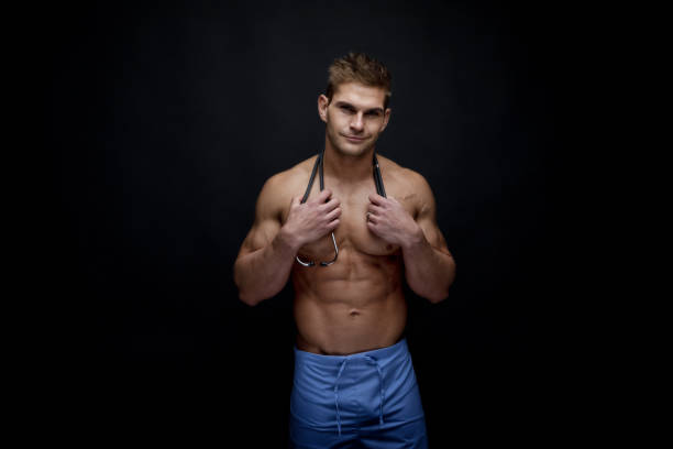 sexy shirtless male nurse - male stripper imagens e fotografias de stock