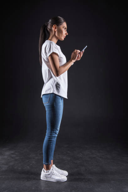 istock Cheerful attractive woman using social media 950826058