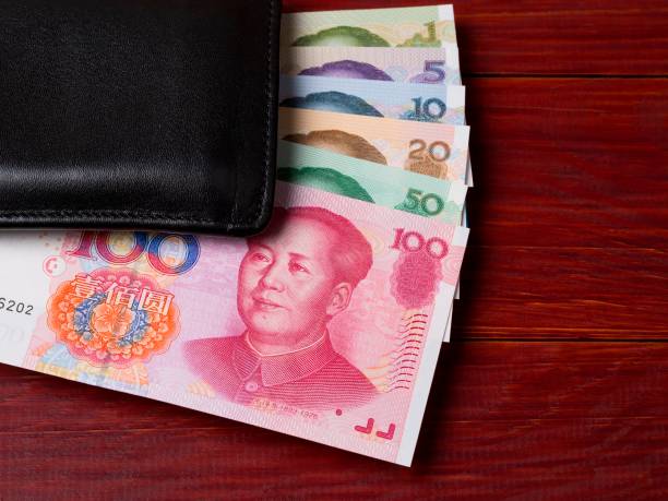 istock Chinese yuan in the black wallet 950832718