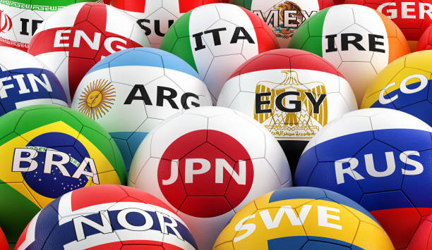 istock soccer balls colored in different national flag colors - 3D rendering 950839354