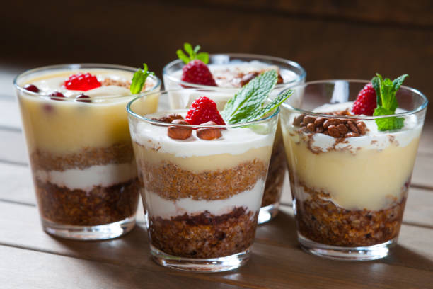 istock Dessert with berries, jelly, cream, nuts and mint leaf 950840984