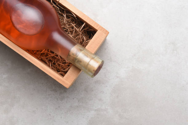 istock A bottle of Rose wine in a wood box 950841456