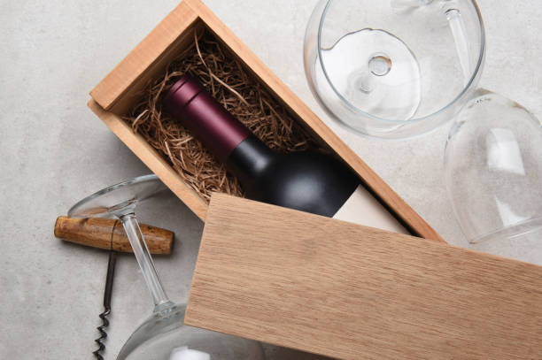 istock Cabernet in a wood box partially covered by its lid 950841534