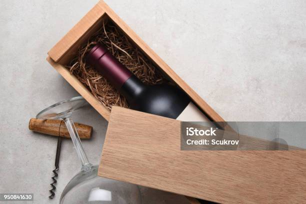 Cabernet In A Wood Box Partially Covered By Its Lid Stock Photo - Download Image Now