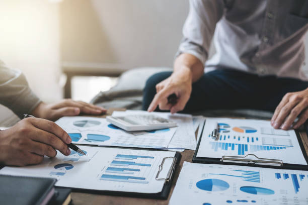 istock Young businessteam working with new startup project. discussing the charts and graphs showing the results at meeting. Business accounting and financial concept 950844680