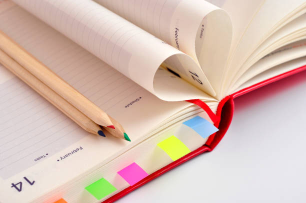 istock Valentines date in notebook and Heart of pages. 950850856