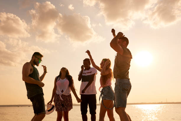 istock Cheerful hilarious friends dancing together 950854406