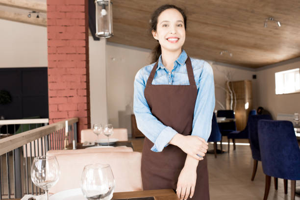 istock Happy friendly pretty waitress in restaurant 950855154