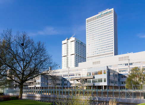Rotterdam,The Netherlands - april 2018: early morning sun on Erasmus Medisch Centrum hospital. View from Museum park