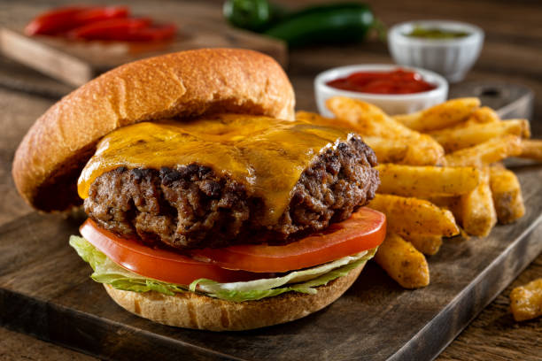 cheeseburger and fries - char grilled imagens e fotografias de stock