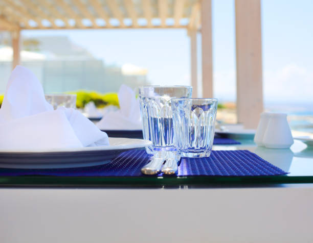 istock Glasses and plates on the tables 950856524