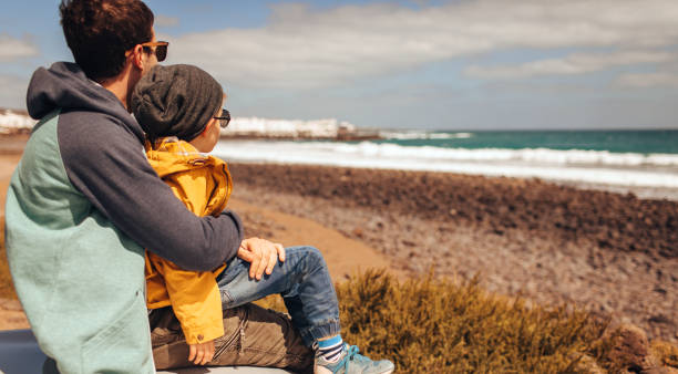 istock Enjoying seaside view with my dad 950860990