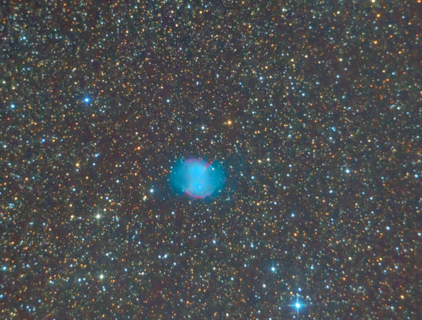 istock Planetary nebula dumbbell in an infinite space space. Formed at the final stage of the evolution of the red giant's star. 950866796