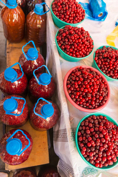 istock Sour cherries in container and jam 950879860