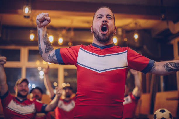 istock Football fan in bar 950882548