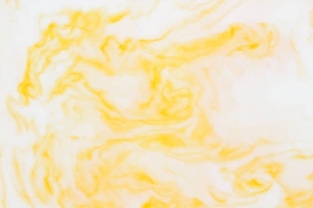 istock Yellow white abstract background, yellow pattern of paints on liquid, blank for designer, paint divorces in milk, bright texture on white background, minimalism, creative blank for wallpaper 950884148
