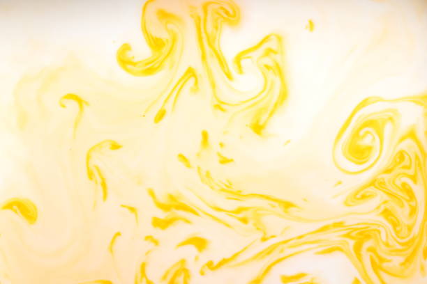 istock Yellow white abstract background, yellow pattern of paints on liquid, blank for designer, paint divorces in milk, bright texture on white background, minimalism, creative blank for wallpaper 950884268
