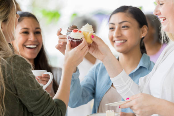 istock Young women celebrate birthdays together 950886922