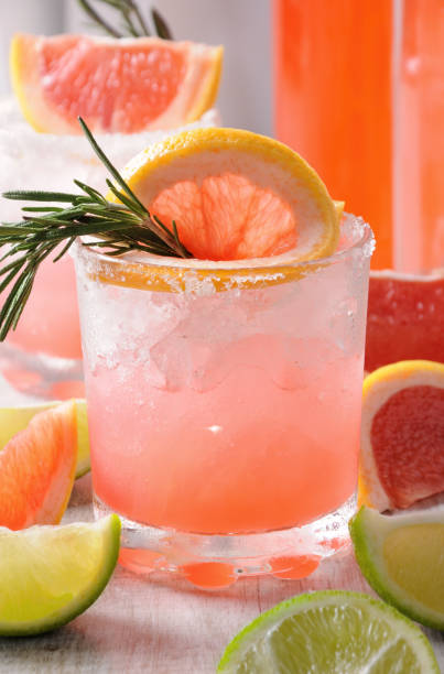This magnificent cocktail of fresh pink Palomas stock photo