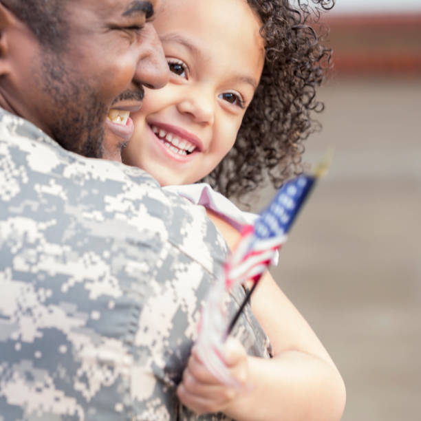 istock Soldier is sad to leave young daughter 950887160