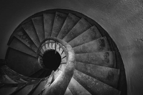 istock Beautiful spiral staircase in black and white 950891382