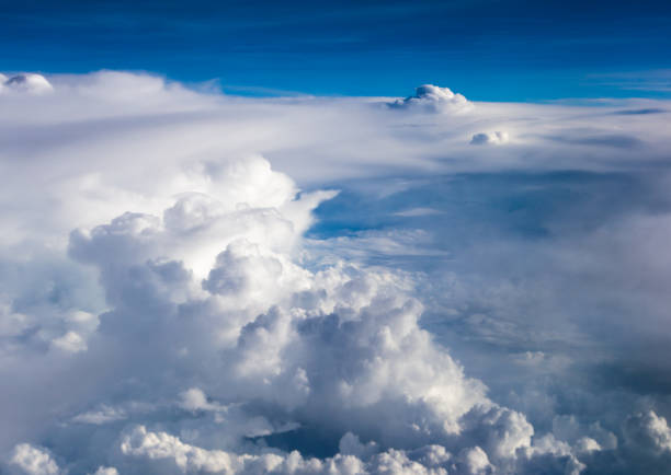 istock blue sky with the clouds from the plane view 950891544