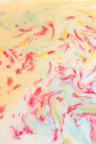 istock Multicolored abstract background, multicolored pattern of paints on liquid, blank for designer, paint divorces in milk, bright texture on white background, minimalism, creative blank for wallpaper 950892050