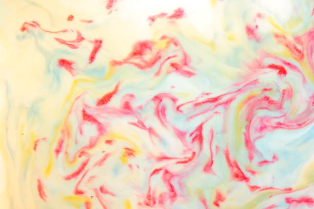 istock Multicolored abstract background, multicolored pattern of paints on liquid, blank for designer, paint divorces in milk, bright texture on white background, minimalism, creative blank for wallpaper 950892074