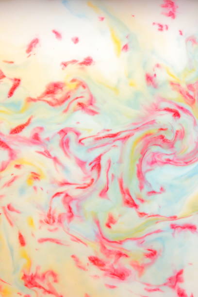 istock Multicolored abstract background, multicolored pattern of paints on liquid, blank for designer, paint divorces in milk, bright texture on white background, minimalism, creative blank for wallpaper 950892092
