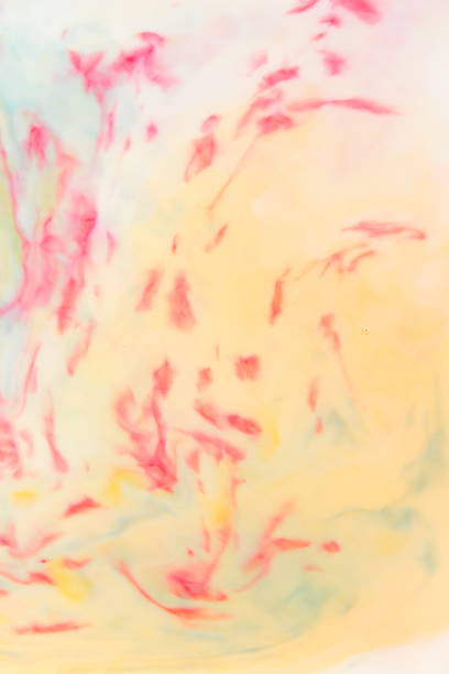 istock Multicolored abstract background, multicolored pattern of paints on liquid, blank for designer, paint divorces in milk, bright texture on white background, minimalism, creative blank for wallpaper 950892224
