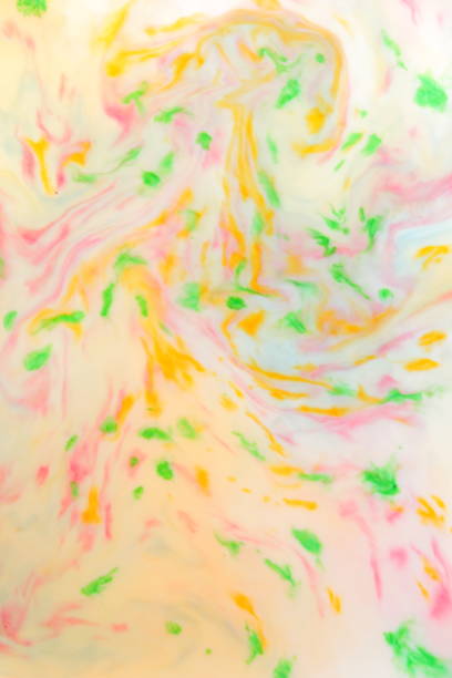 istock Multicolored abstract background, multicolored pattern of paints on liquid, blank for designer, paint divorces in milk, bright texture on white background, minimalism, creative blank for wallpaper 950892264