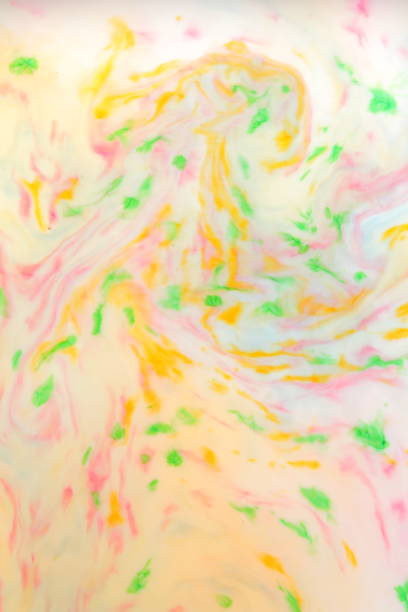 istock Multicolored abstract background, multicolored pattern of paints on liquid, blank for designer, paint divorces in milk, bright texture on white background, minimalism, creative blank for wallpaper 950892394