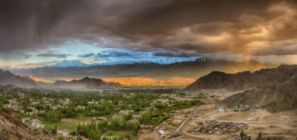 Sunset on a rainy evening in the Leh valley in the Himalayas