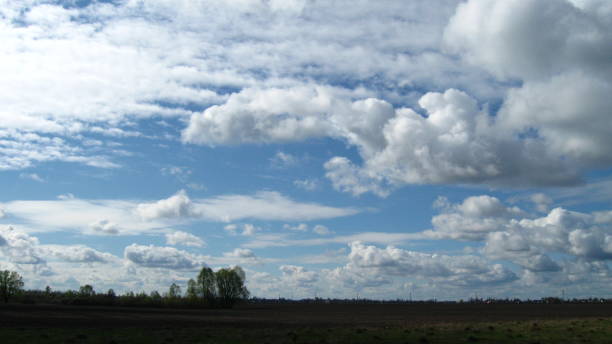 istock Interesting Cumulus Clouds in the Blue Sky 950899756