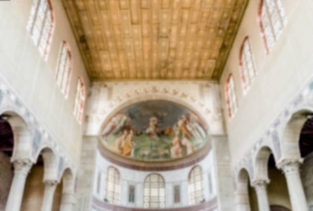 Defocused background with interiors of a roman Basilica. Intentionally blurred post production for bokeh effect