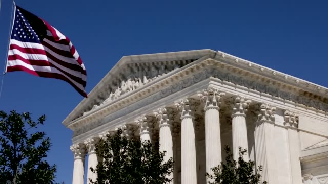 Supreme Court of the United States and American Flag in Washington, DC