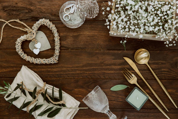 istock Flat lay Wedding table decoration in rustic style on wooden background. 950903696