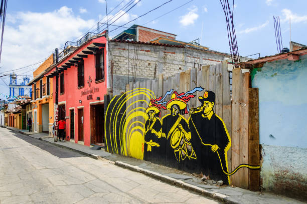 Street scene with street art on wooden fence