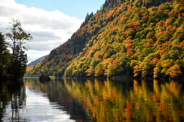 istock Lake surrounded by mountains in the fall 950904352