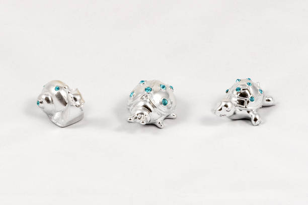 istock Ornamental silver snail, ladybird and turtle with gemstones 950909330