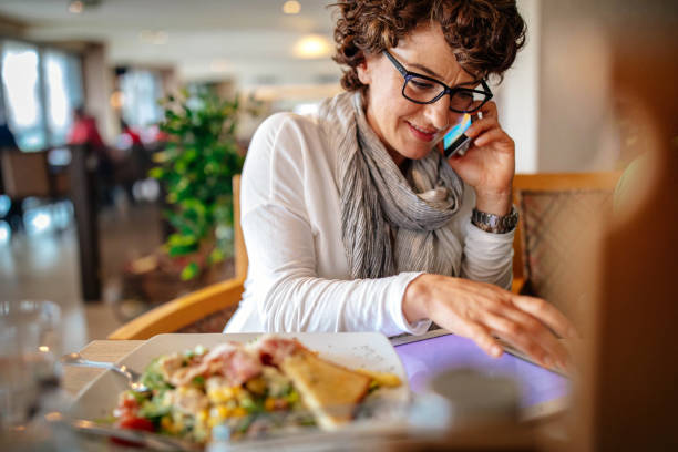 istock Woman at a restaurant 950911396