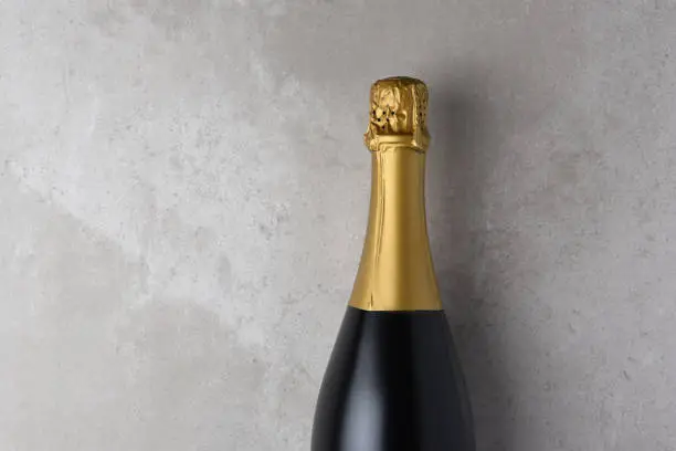 Champagne bottle closeup with copy space.