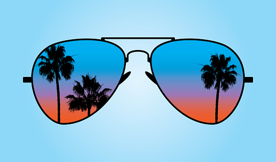 Vector illustration of a pair of sunglasses with palm trees and twilight sky reflected on the lens against a blue background.